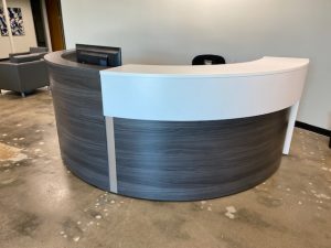 white circular reception desk 