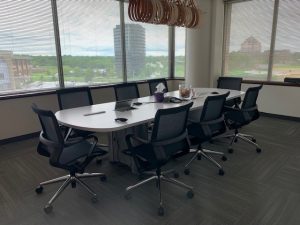 Having the net cloth chair and round table in the conference room.